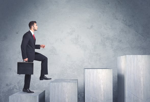 Business person stepping up a staircase-Apr-16-2024-04-04-53-3484-AM