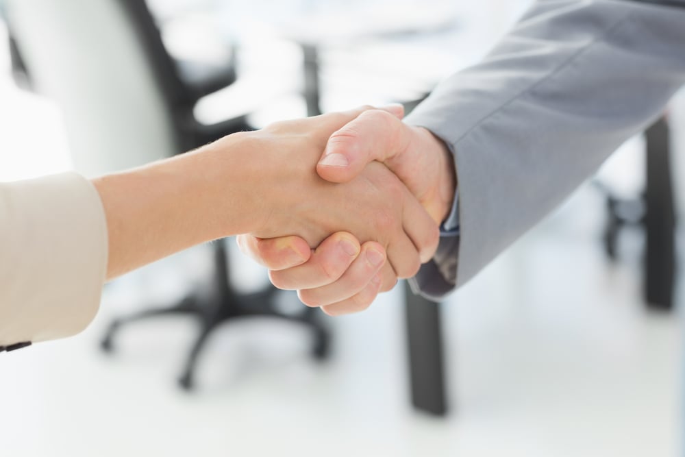 Close-up of shaking hands after a business meeting in the office-1