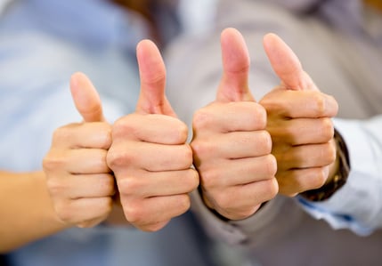 Group of hands with thumbs up expressing positivity-1