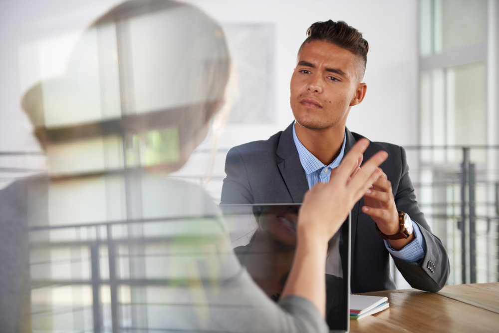 team of successful business people having a meeting in executive sunlit office team of successful business people having a meeting in executive sunlit office
