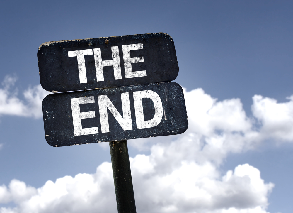 The End sign with clouds and sky background-3
